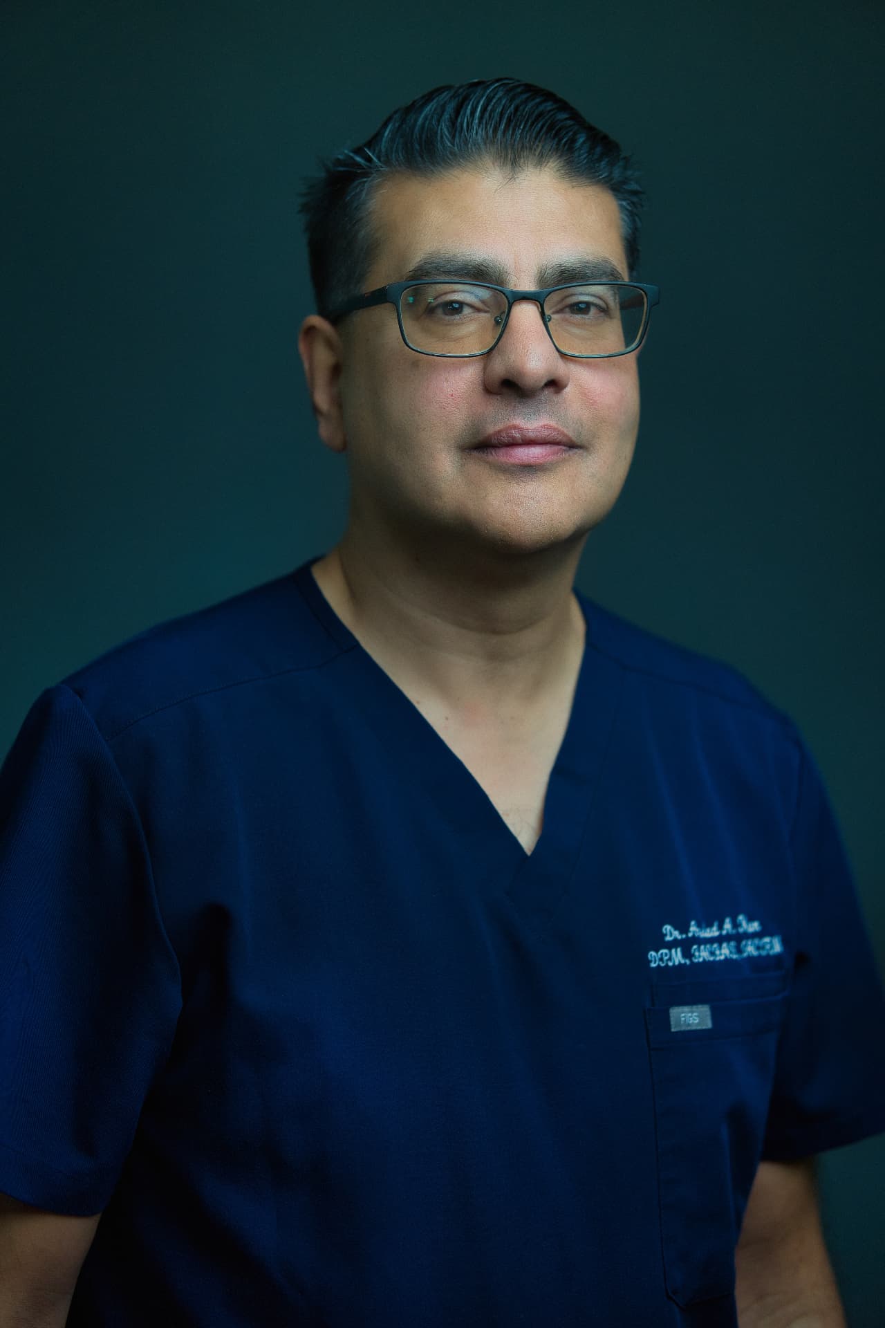 Arshad Khan, DPM, FACFAS, FACFAOM